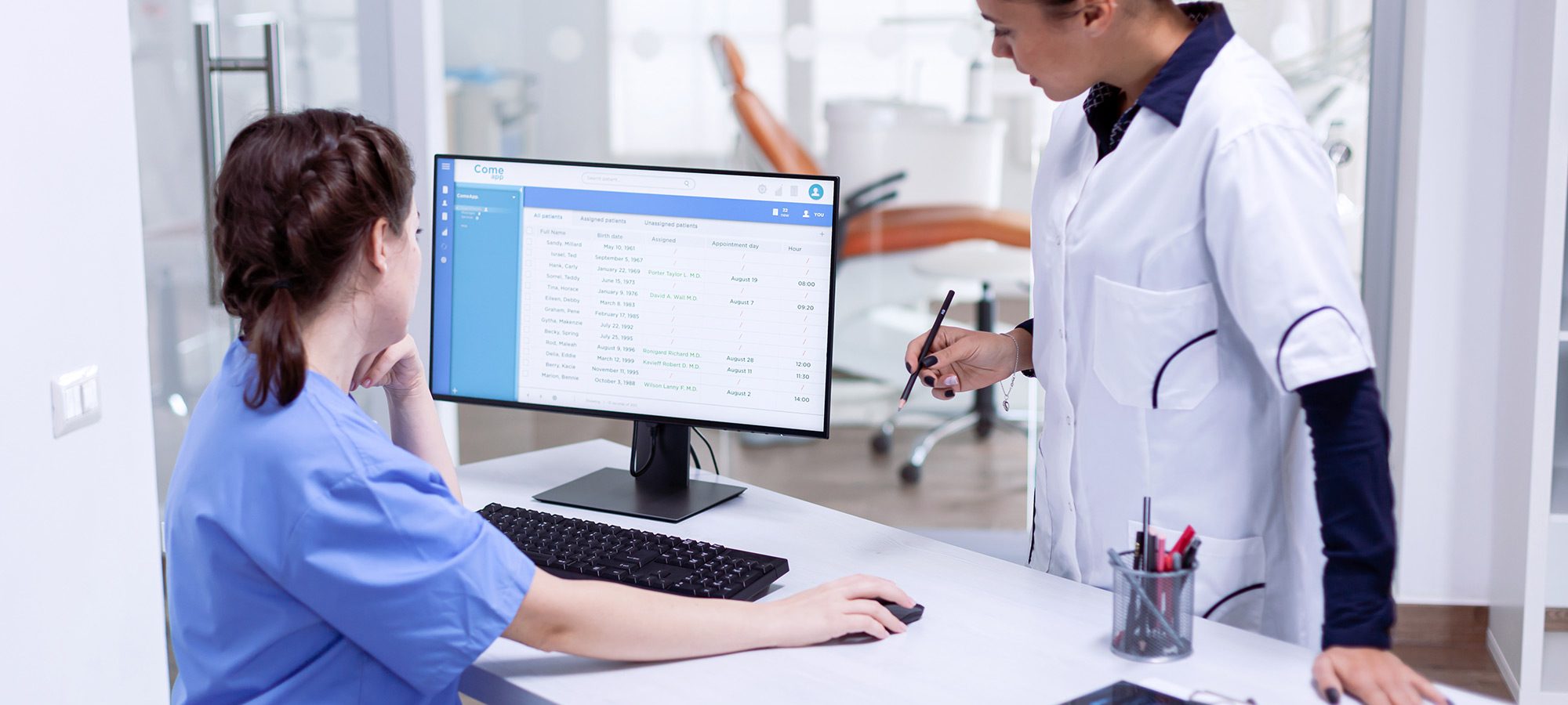 stomatolog-nurse-tooth-clinic-checking-patient-appointment-looking-computer-monitor-stomatology-assistant-teeth-doctor-discussing-reception-dental-office
